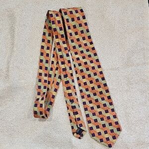 Geometric Patterned Tie in Orange, Green, and Purple‎